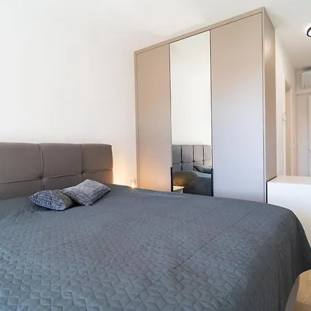 Cosmopolitan By Belmont Realty *
