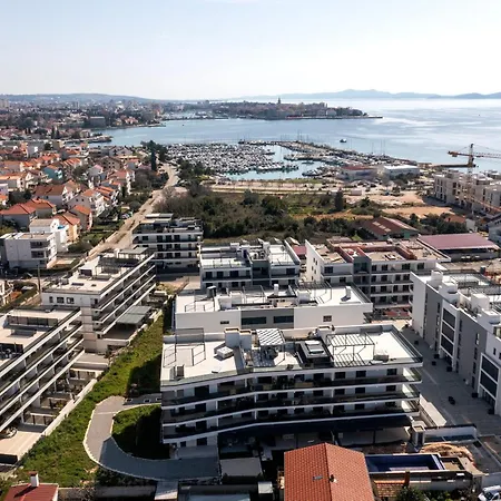 Cosmopolitan By Belmont Realty